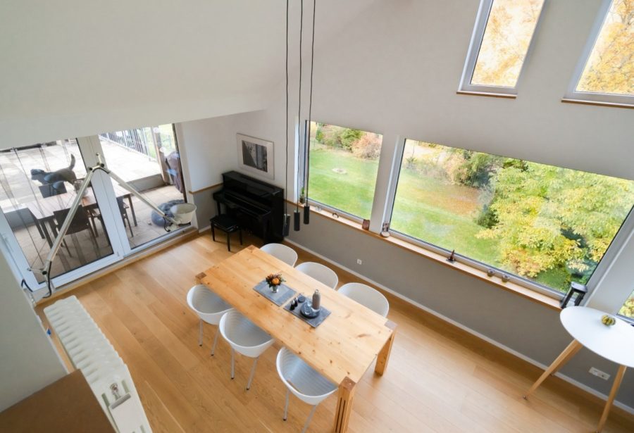 Double-height living space with panoramic glazing